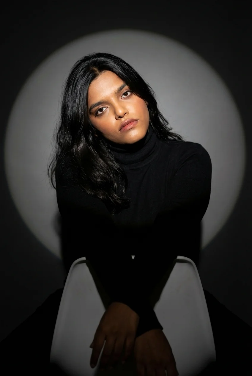 a_woman_with_a_smooth_warm-medium_complexion_with_golden_undertones_long_straight_sleek_dark_hair_s_yb0dutt67486bxorkyme_1